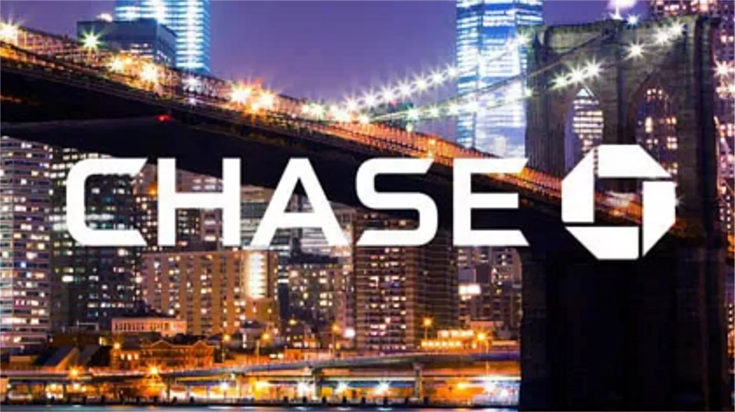 Chase logo over illuminated nighttime cityscape