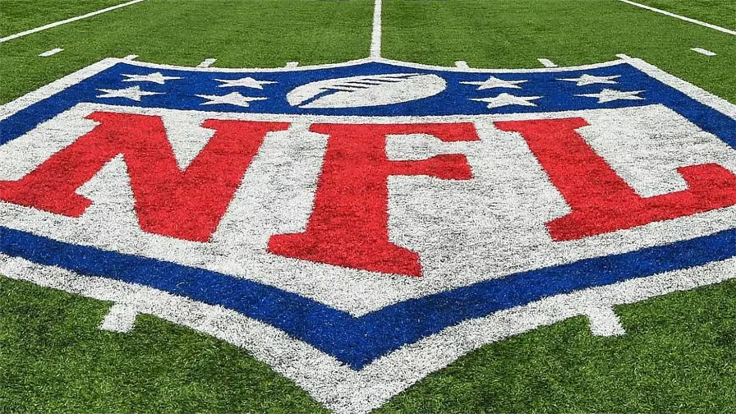 NFL logo centered on professional football field