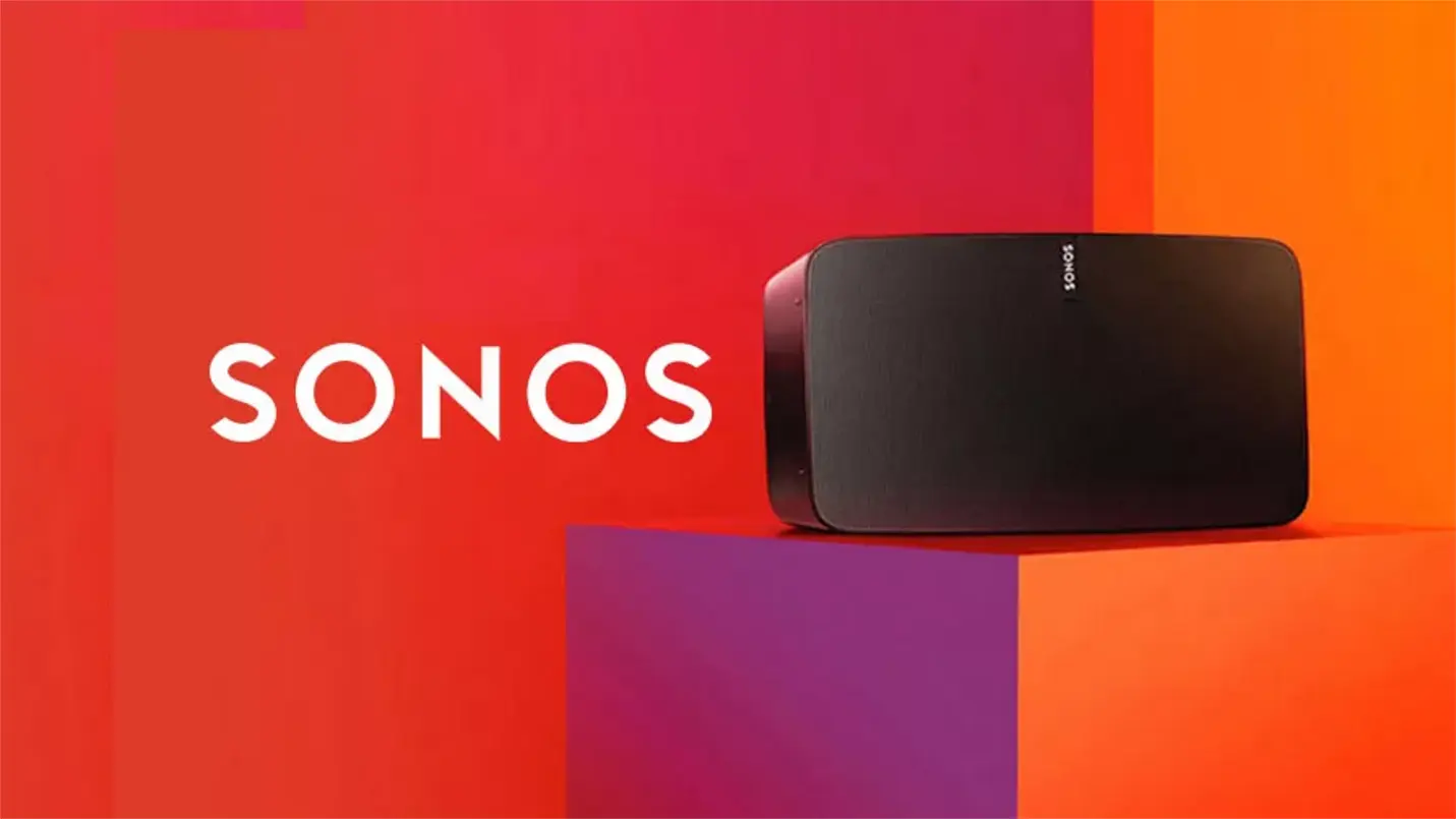 Sonos smart speaker set against bold red and orange backdrop