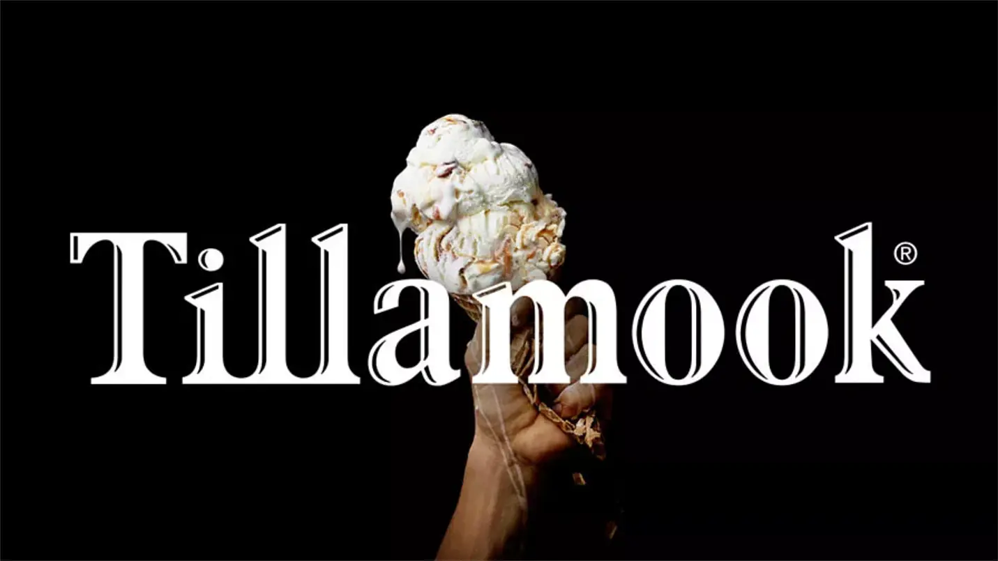 Hand holding a scoop of Tillamook ice cream