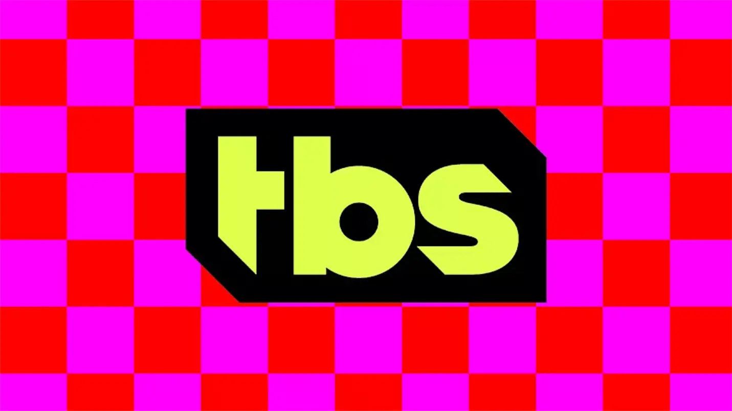 TBS logo with bright pink checkerboard design