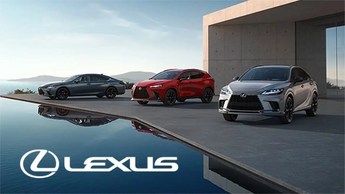 Lexus coupe driving through scenic mountain landscape